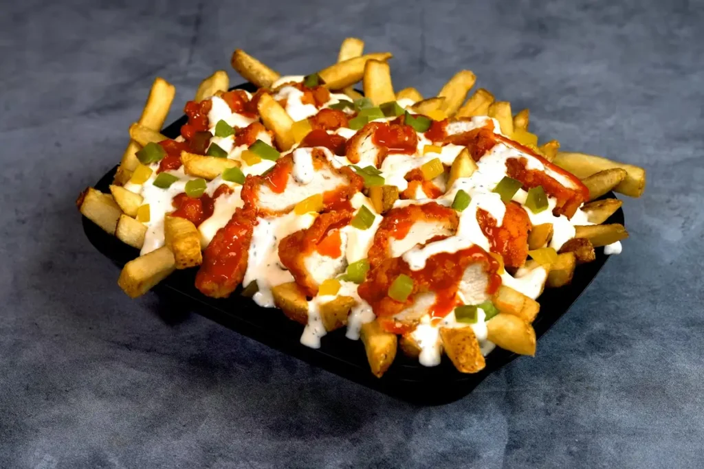Buffalo tender loaded fries topped with crispy chicken, buffalo sauce, white sauce, and diced peppers