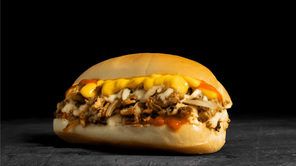 Pardon My Take introduces Pardon My Cheesesteak Buffalo Chicken Cheesesteak available for delivery near you